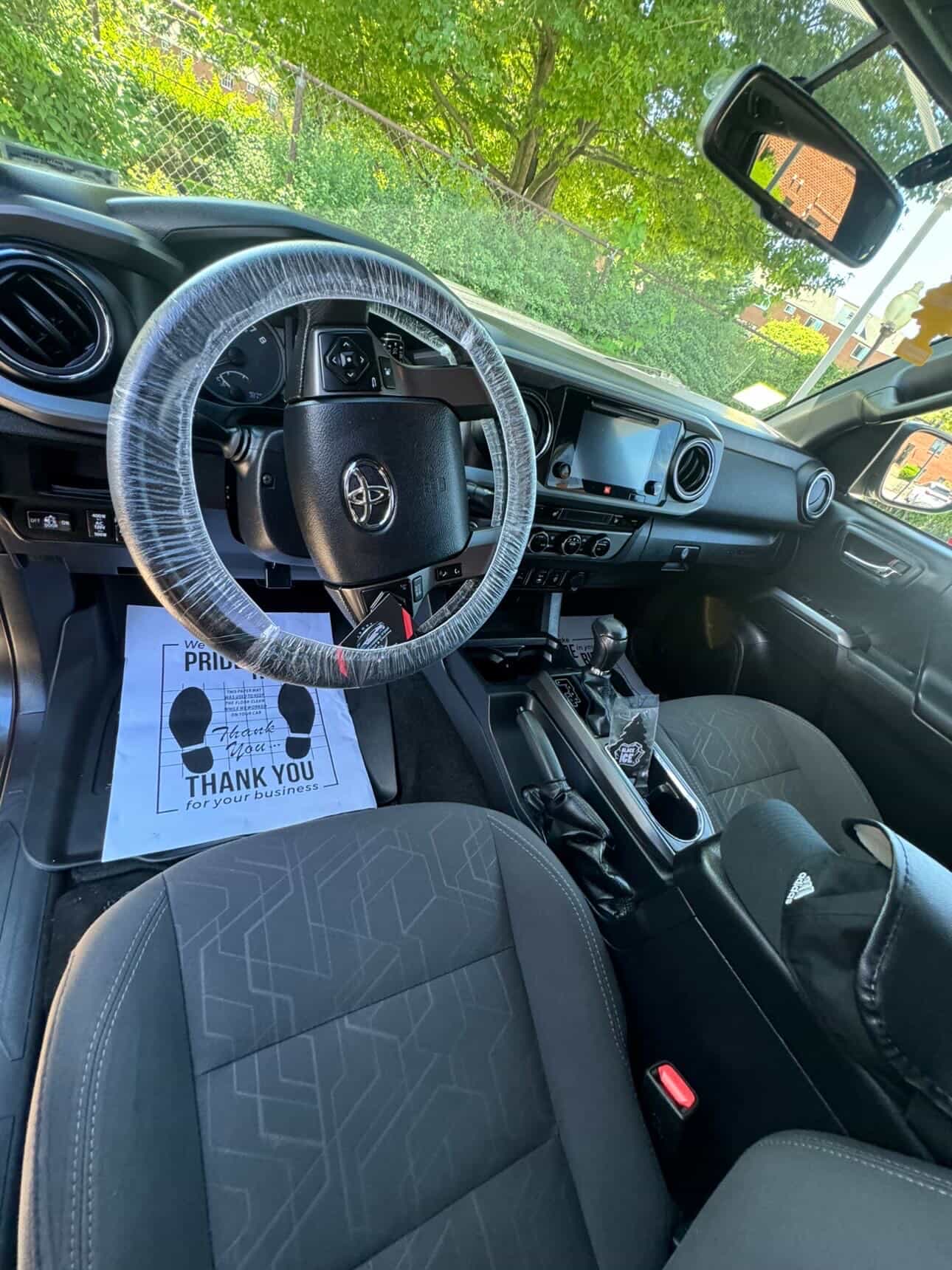 Clean Toyota Tacoma dashboard and steering wheel